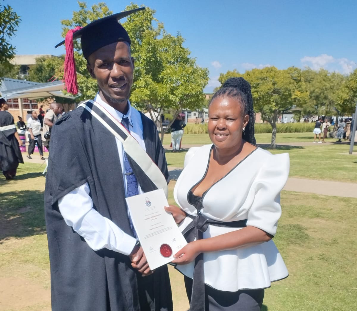 The Ratang Bana graduate in the graduation outfit provided by Beyond Bricks Foundation