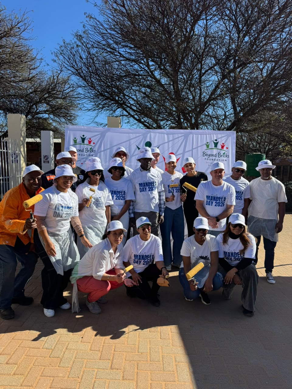 The Stevensons volunteer team painting the community space
